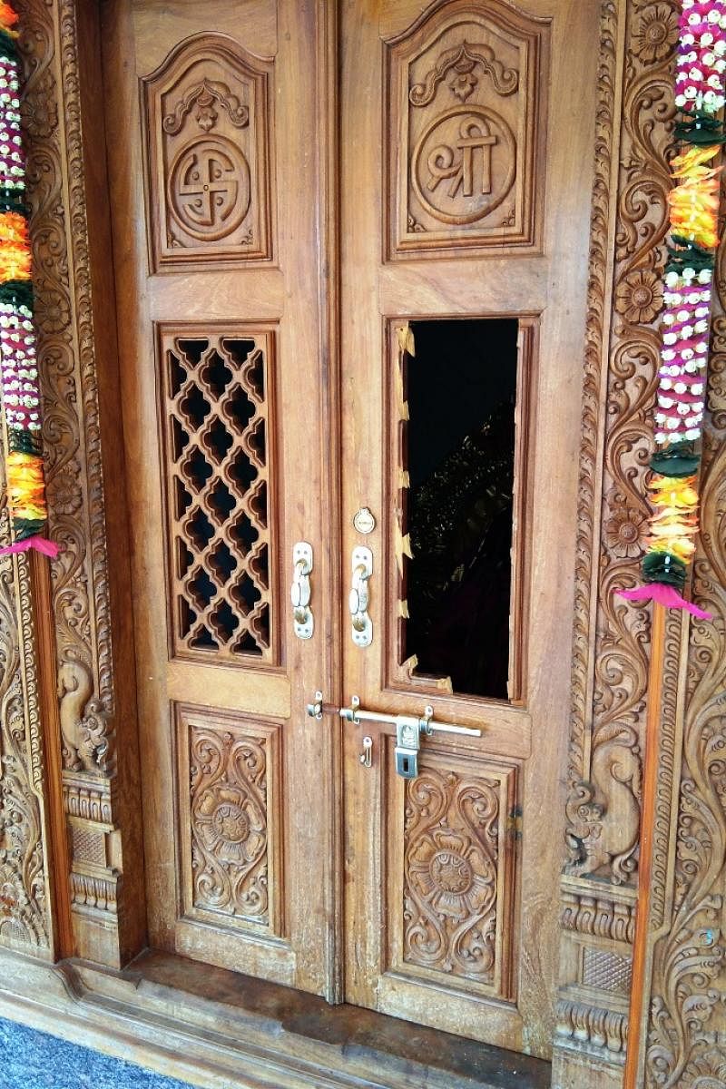 The Balehonnur Chamundeshwari Temple door broken open by thieves.