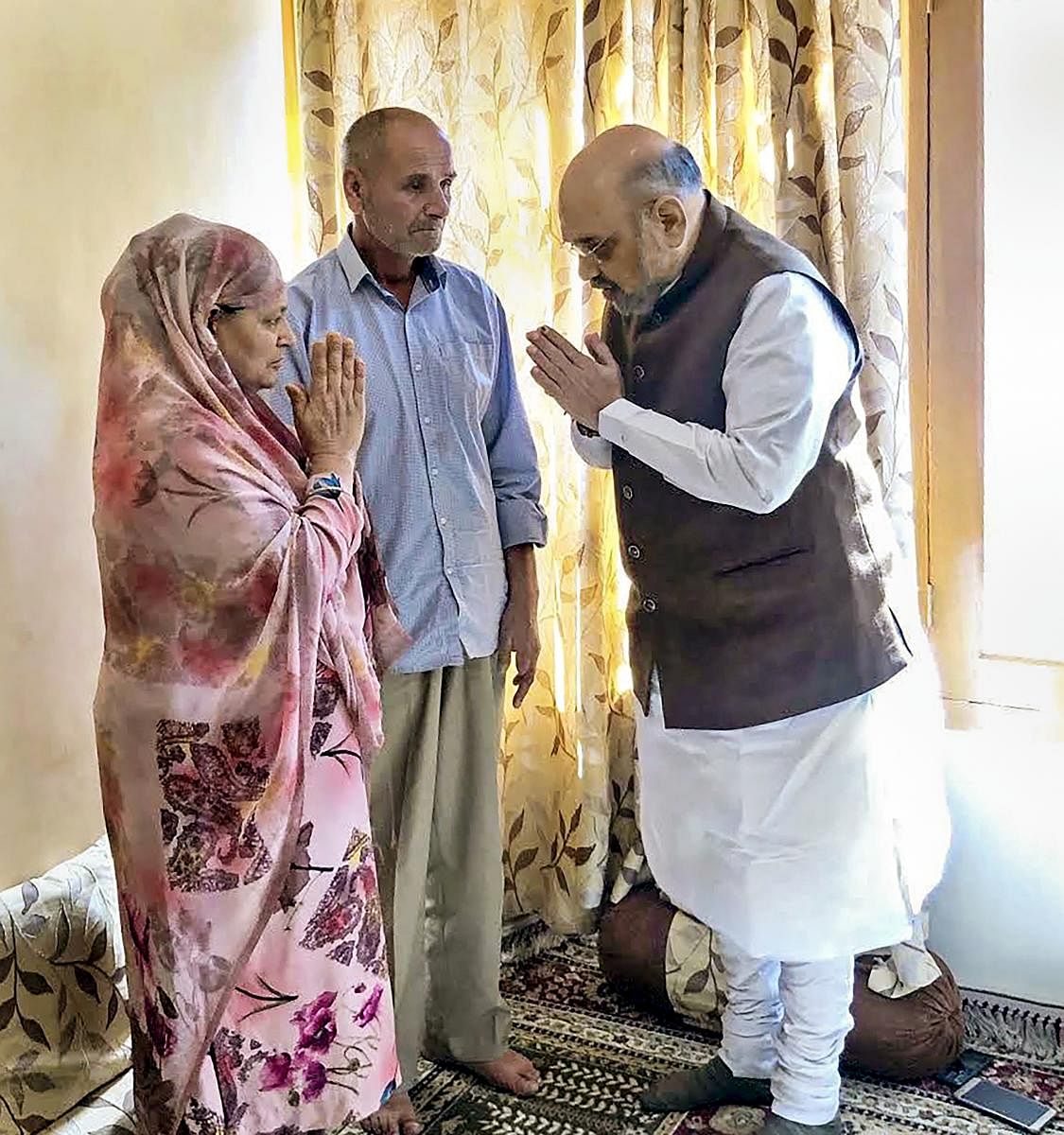 Union Home Minister Amit Shah visits the family of Jammu and Kashmir Police inspector Arshad Ahmed Khan, in Srinagar, on June 27, 2019. Khan was killed in a terror attack in Anantnag on June 12. PTI