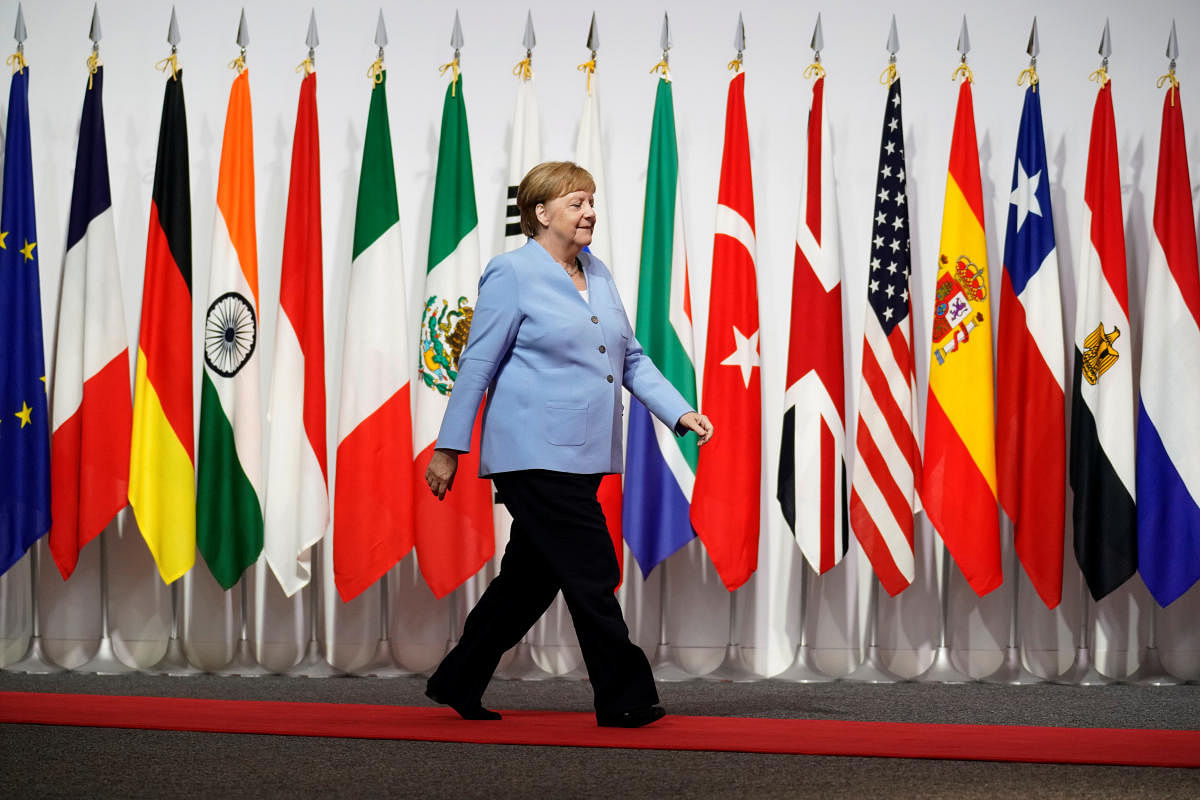 Germany's Chancellor Angela Merkel arrives at the G20 leaders summit in Osaka, Japan, June 28, 2019. REUTERS/Kevin Lamarque