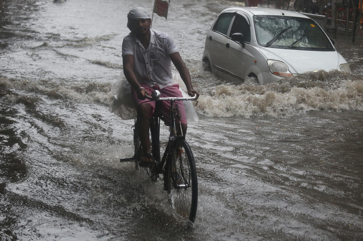 Heavy rains caused water-logging in several parts of Nashik city, including Saraf Bazar, near Mayor's official residence, Gangapur Road and Old Agra Road, disrupting normal life. (Reuters Photo)