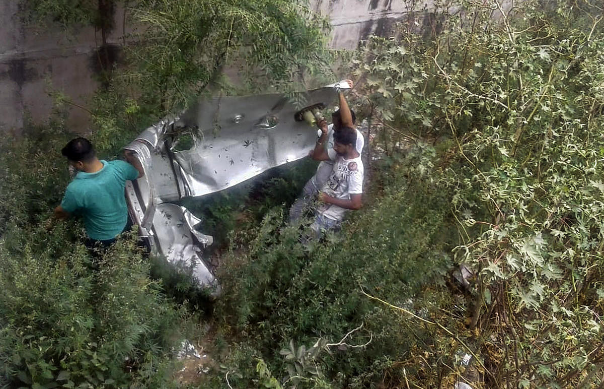 Wreckage of the Jaguar fighter plane's fuel tank, which was jettisoned along with practice bombs by its pilot in an attempt to land safely after a bird-hit, near Ambala, Thursday, June 27, 2019. (PTI Photo)