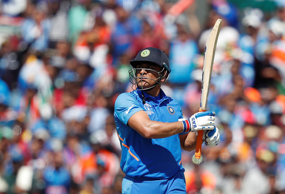 Former Australia batsman Dean Jones believes that Mahendra Singh Dhoni should bat at the crucial number four position for India in the remaining matches of the ongoing World Cup. (Reuters Photo)