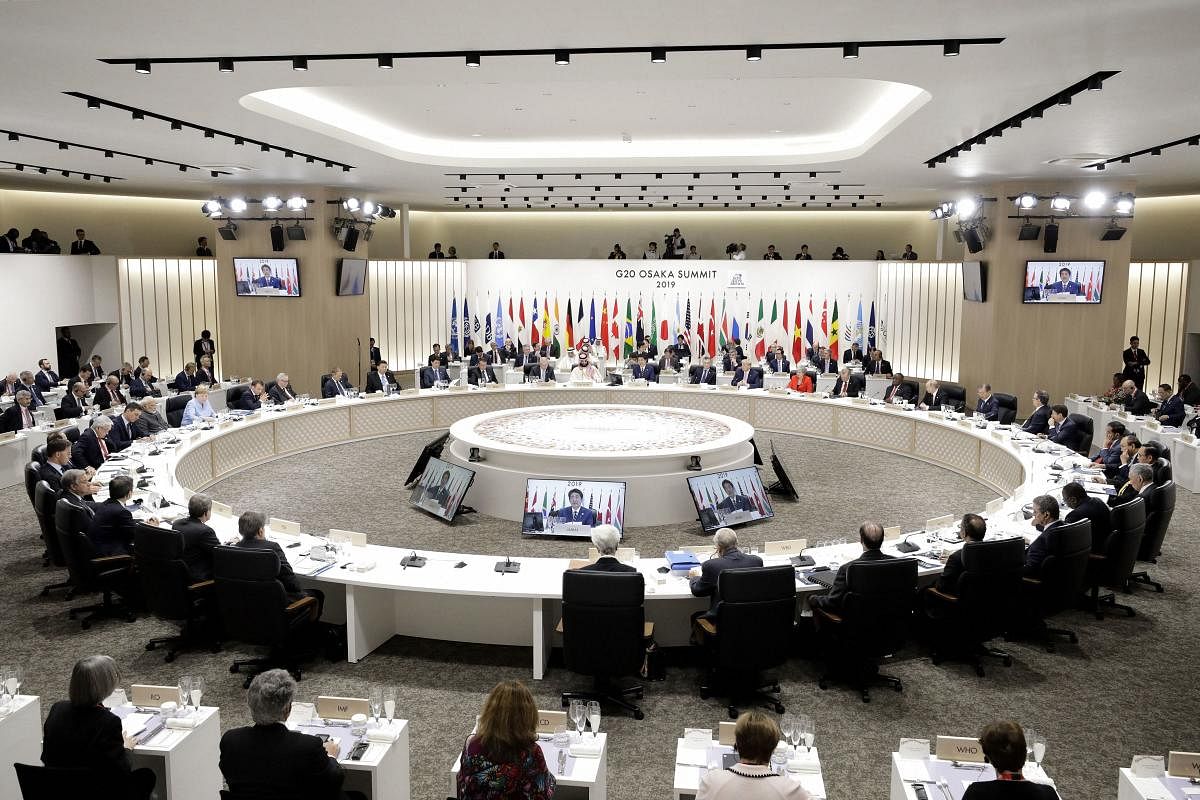 Japan's Prime Minister Shinzo Abe, center, speaks while other leaders listen during a working lunch at the Group of 20 (G-20) summit in Osaka, western Japan, Friday, June 28, 2019. (AP/PTI)