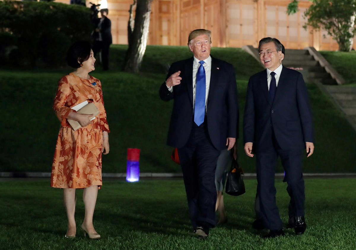 U.S. President Donald Trump and South Korean President Moon Jae-in leave after a banquet at the Presidential Blue House in Seoul, South Korea, June 29, 2019. Yonhap via REUTERS ATTENTION EDITORS - THIS IMAGE HAS BEEN SUPPLIED BY A THIRD PARTY. SOUTH KOREA