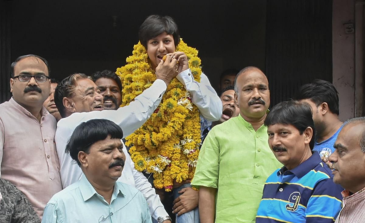 BJP MLA Akash Vijayvargiya is garlanded after being released from the district jail, three days after being arrested for assaulting a civic official in Indore with a cricket bat, in Indore. (PTI Photo)