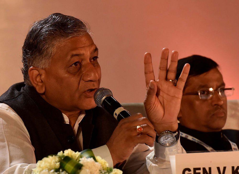 Union Minister VK Singh addressing at the seminar on the 'Indian Diaspora: Catalysts for Realizing India's Development' also seen Dyaneshwar N Mulay, Secretary (CPV and OIA), Minister of External Affairs Pravasi Bharatiya Divas at Bengaluru International Exhibition Centre, in Bengaluru on Sunday. DH photo by M S Manjunath
