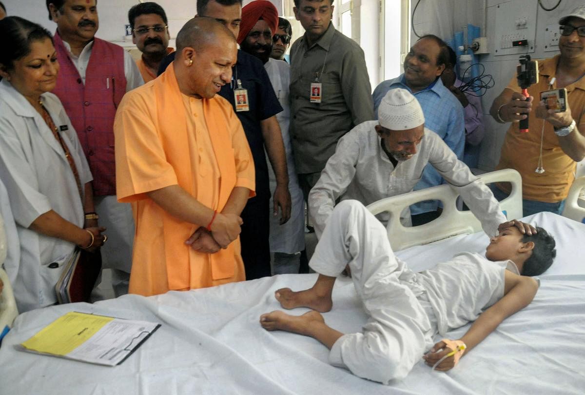 Uttar Pradesh Chief Minister Yogi Adityanath visits a district hospital for inspection, in Moradabad. (PTI Photo)