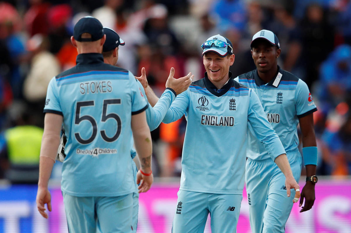 Cricket - ICC Cricket World Cup - England v India - Edgbaston, Birmingham, Britain - June 30, 2019 - England's Eoin Morgan celebrates with teammates after the match. Reuters