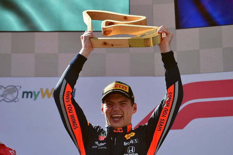Max Verstappen with the trophy after winning a controversial Austrian Grand Prix. Picture credit: AFP