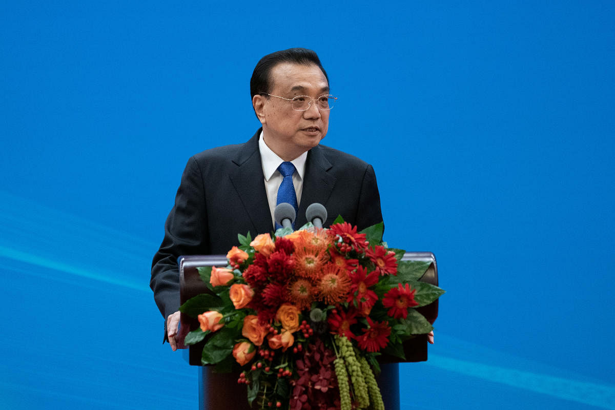 China will ease ownership limits for foreign investors in its financial sector in 2020, Premier Li Keqiang said. (Reuters Photo)