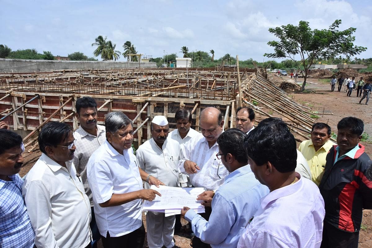 MLA Jagadish Shettar inspects the sewage treatment plant construction work near Bhairidevarakoppa in Hubballi on Monday.