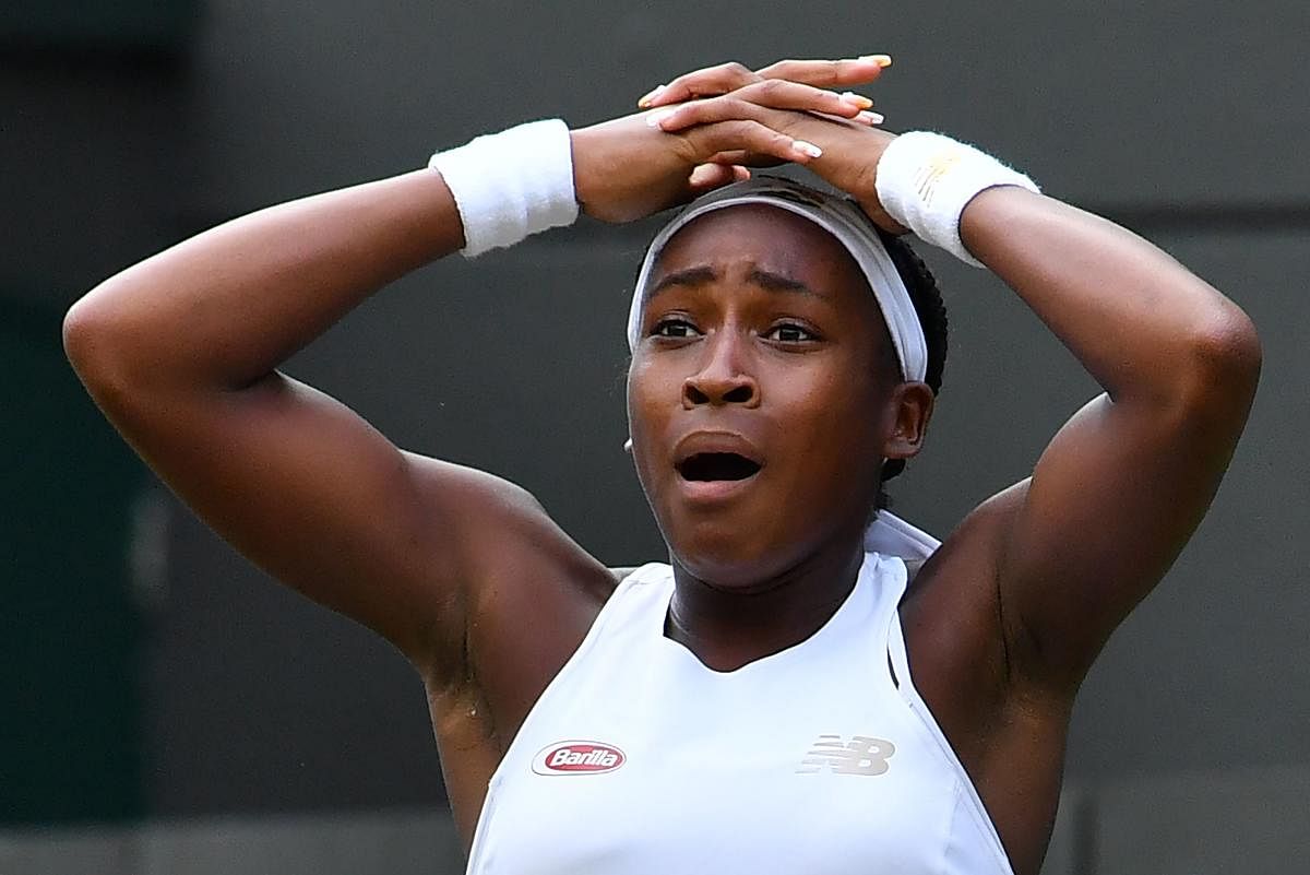 Cori Gauff celebrates beating Venus Williams during their women's singles first round match on the first day of the 2019 Wimbledon Championships. AFP