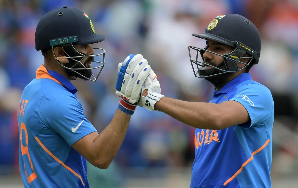 Rohit's 104 off 92 balls in the 28-run win over Bangladesh guided India to the World Cup semi-finals here on Tuesday and in the process he also equalled Kumar Sangakkara's record of scoring most tons in a World Cup edition. (AFP Photo)