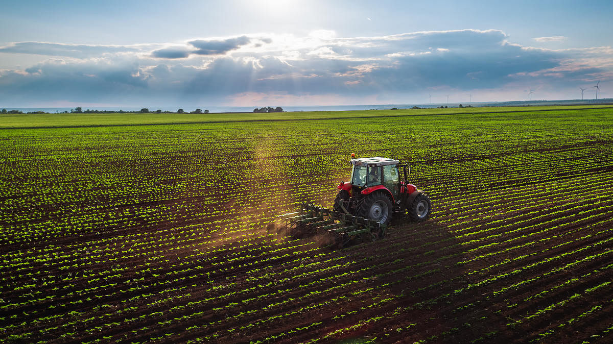 Tractor cultivating field at spring,aerial viewFarmers are increasingly united in the recognition that their environment is changing.
