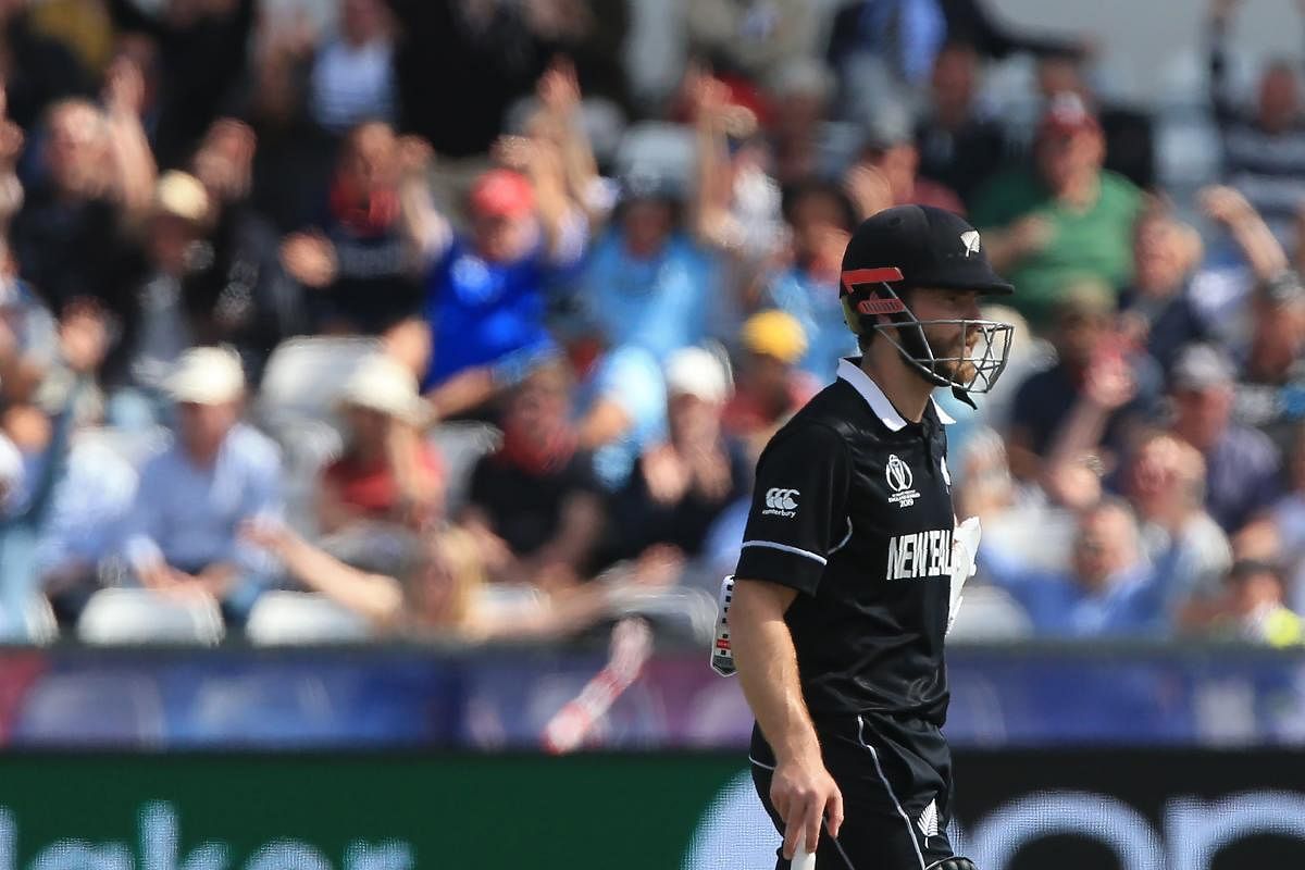 New Zealand's captain Kane Williamson walks off after losing his wicket for 27 during the 2019 Cricket World Cup. (AFP Photo)