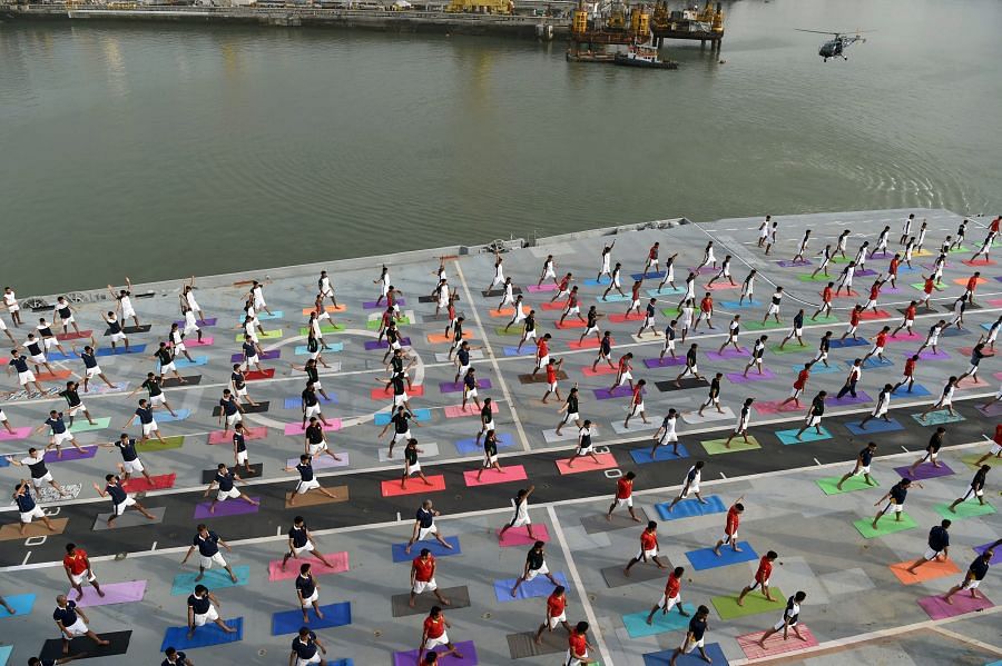 Indian armed personnel performing asanas on International Day of Yoga on June 21. Picture credit: AFP