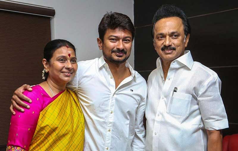 Actor and son of DMK president MK Stalin, Udhayanidhi, who was appointed as the party's youth wing secretary, poses for photos with his father and mother Durga Stalin, in Chennai. (PTI Photo)