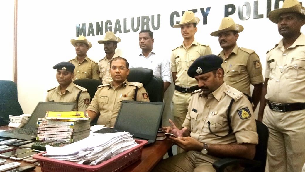 The Mangaluru City Police team which busted the online fraud case.