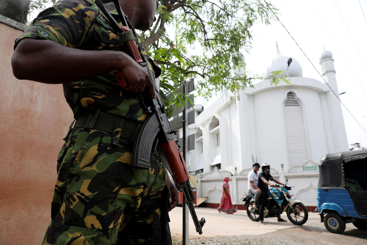 A soldier stands guard outside the Grand Mosque, days after a string of suicide bomb attacks on churches and luxury hotels across the island on Easter Sunday, in Negombo, Sri Lanka April 26, 2019, Reuters File Photo