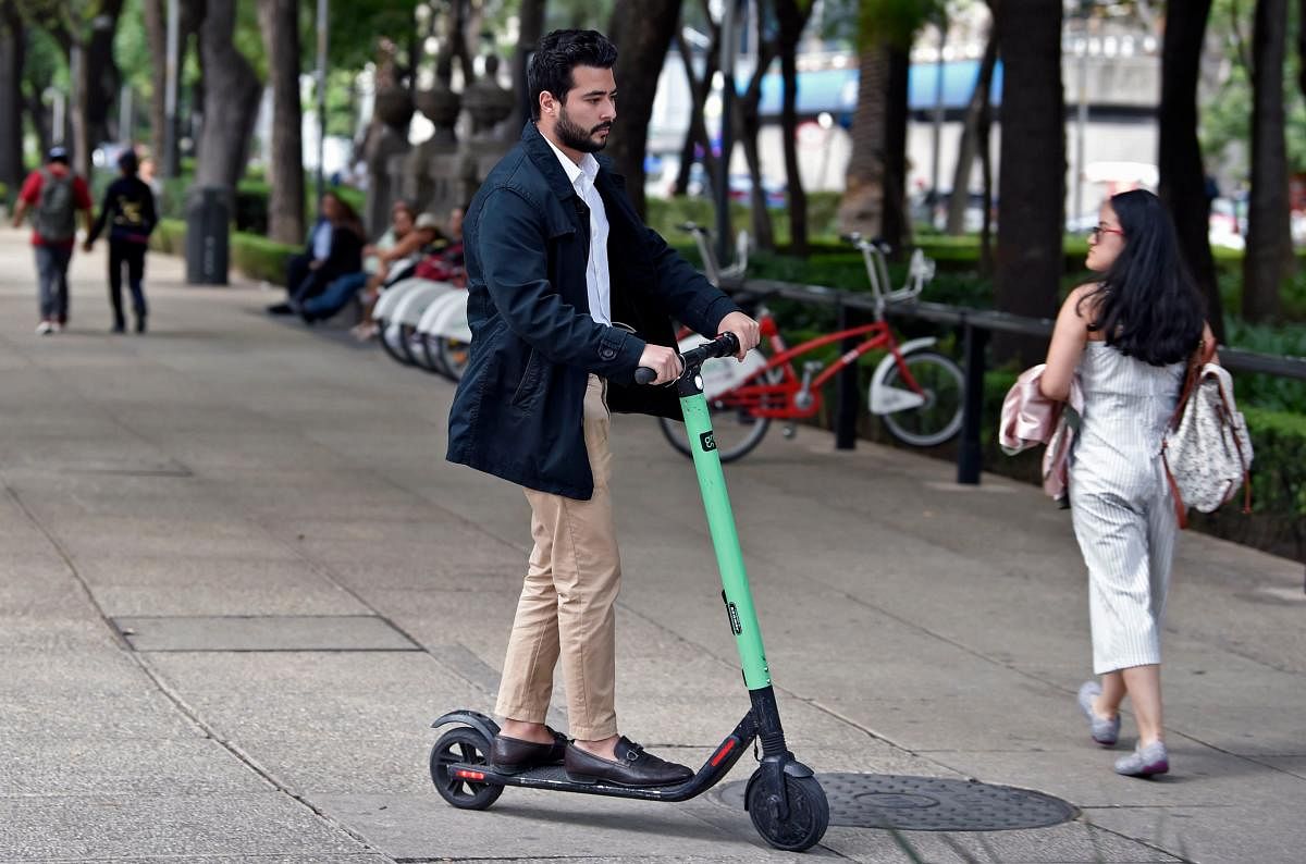 They appeared in June last year as Paris was waking up from its annual all-night Festival of Music: hundreds of green-and-black electric scooters dotting the pavements of the capital. AFP