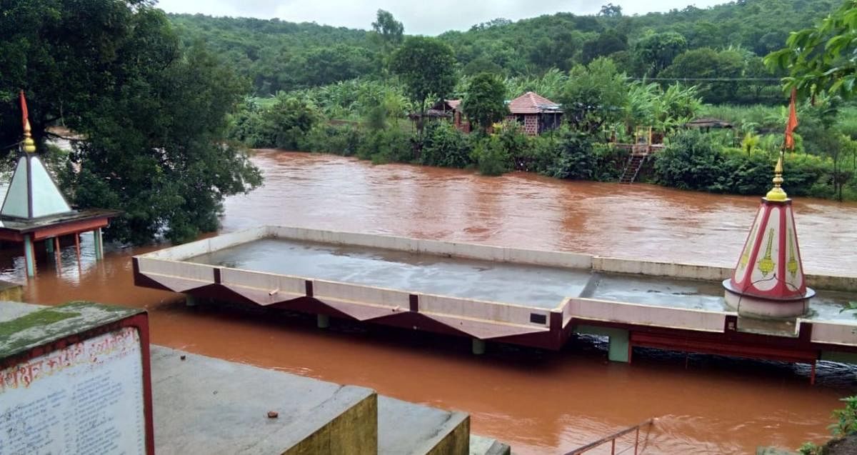 The Hanuman temple at Habbanatti village in Khanapur taluk of Belagavi district submerged in River Malaprabha following heavy rain in the Western Ghats region. DH Photo