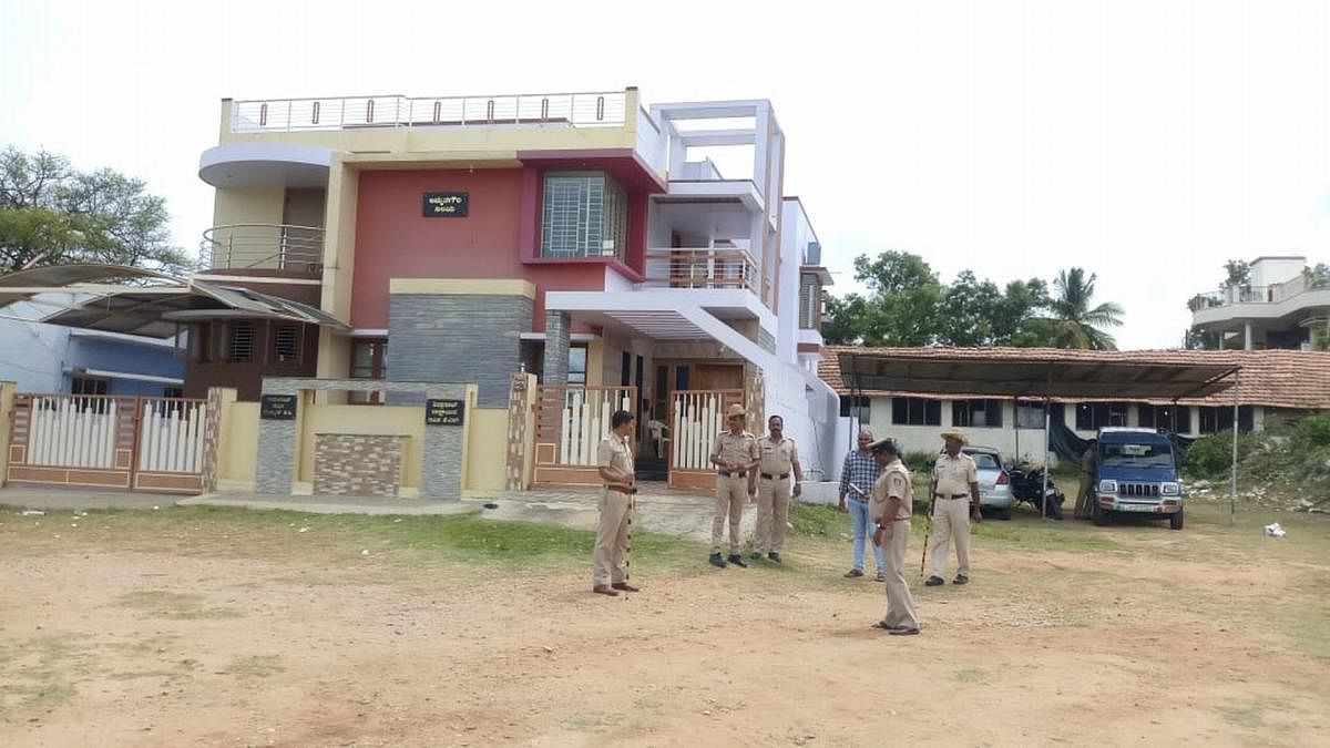Police security near MLA K C Narayanagowda’s house in KR Pet, Mandya district, on Saturday.