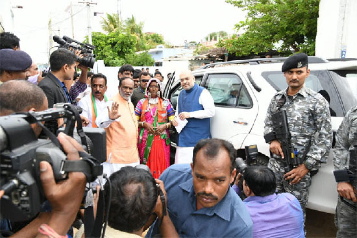 BJP president Amit Shah visits Soni Nayak's home.