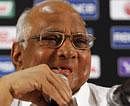 nternational Cricket Council President Sharad Pawar smiles during a news conference ahead of Saturday's Cricket World Cup final match between India and Sri Lanka in Mumbai. AP