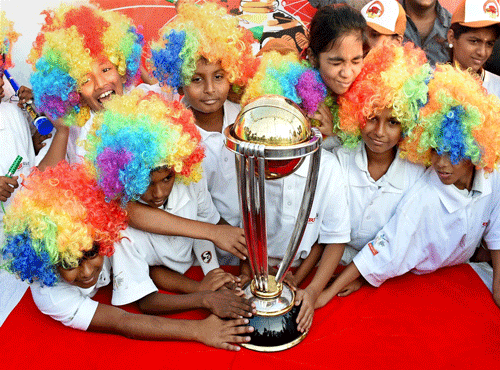 Children pose with ICC World Cup 2015 Trophy. PTI file photo