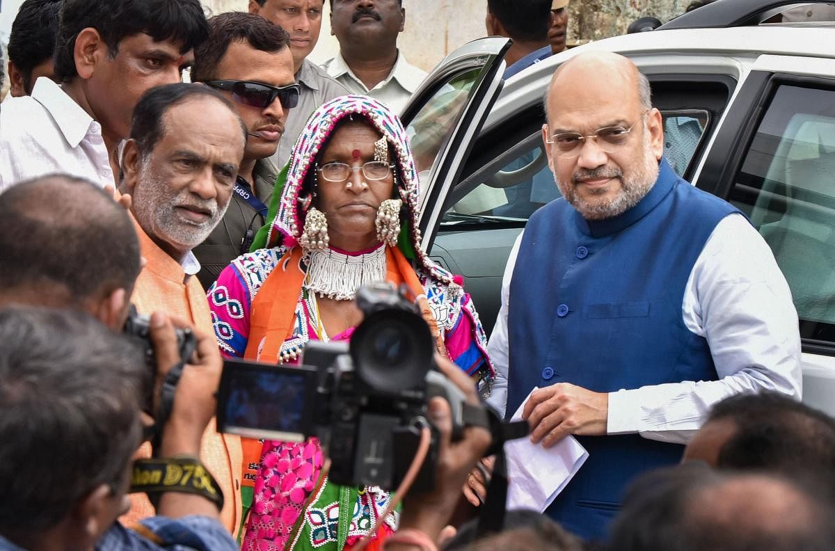 Shah, who held a meeting with key state leaders Saturday night after kicking off the membership campaign, is understood to have told them that 20 per cent vote share meant the party is near power in the state. (PTI Photo)