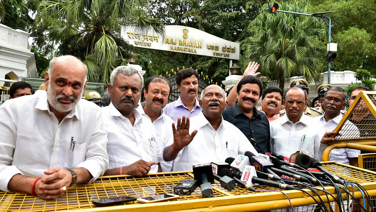 Rebel MLAs address media after submitting a copy of the resignation to the Governor at Raj Bhavan, in Bengaluru on Saturday. DH Photo/Ranju P