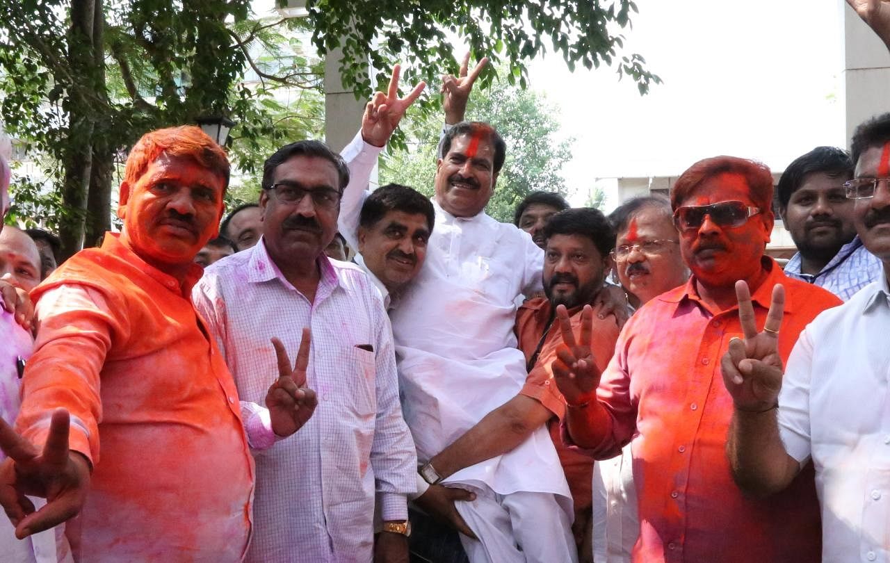 BJP candidate Suresh Angadi celebrating his win from Belgaum Parliamentary Constituency in the premises of the counting centre at RPD College, Tilakwadi in Belagavi on Thursday. MLAs Abhay Patil, Anil Benke and other office bearers are seen.