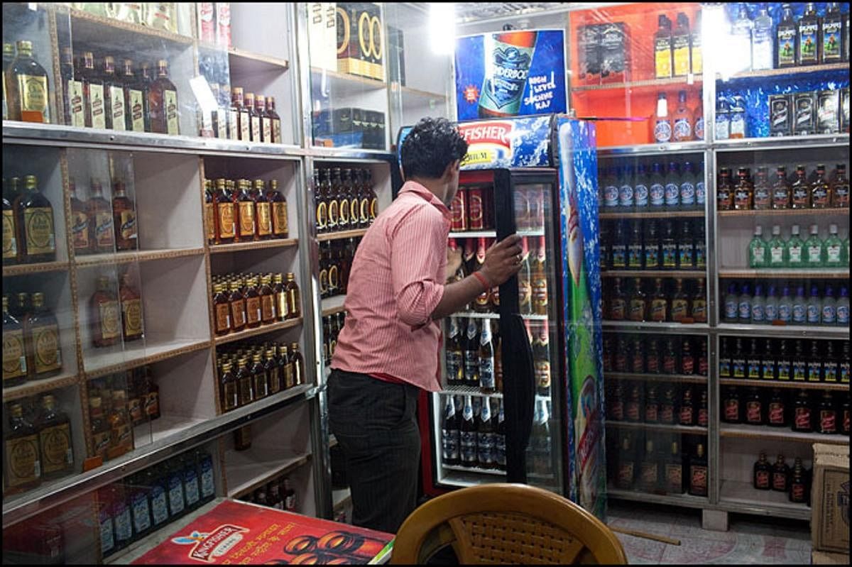 As many as 184.63 lakh boxes of liquor have been sold between April and July against 172.46 lakh boxes during the same period last year. DH File Photo