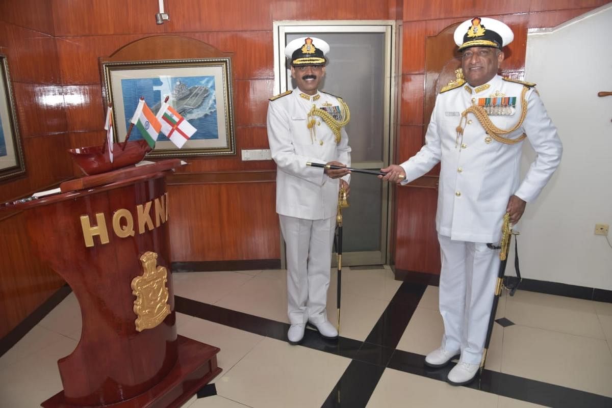 Rear Admiral Mahesh Singh (left) takes charge from Rear Admiral K J Kumar. DH Photo