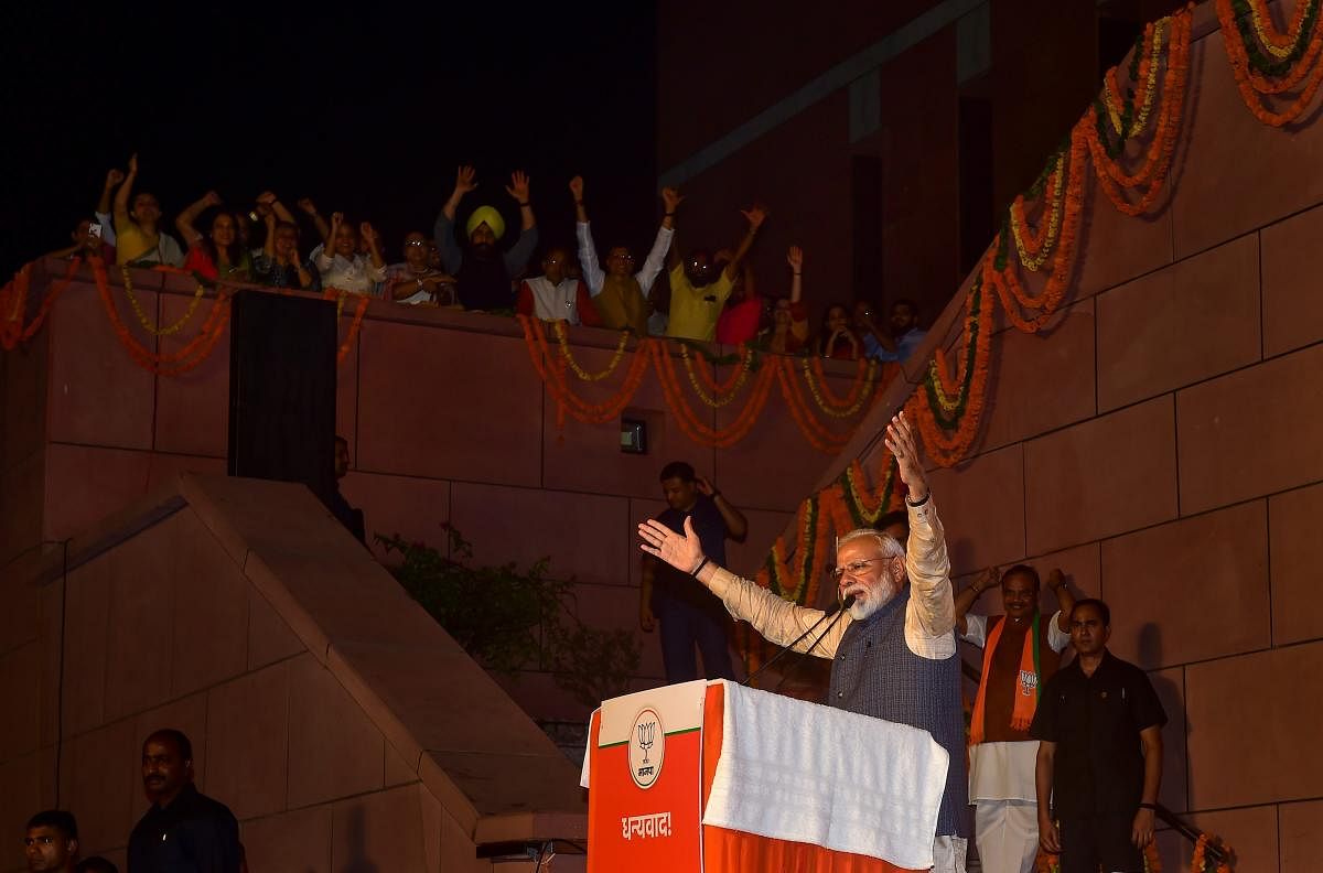 New Delhi: Prime Minister Narendra Modi addresses party supporters at the party headquarters to celebrate the party's victory in the 2019 Lok Sabha elections, in New Delhi, Thursday, May 23, 2019. (PTI Photo/Manvender Vashist)