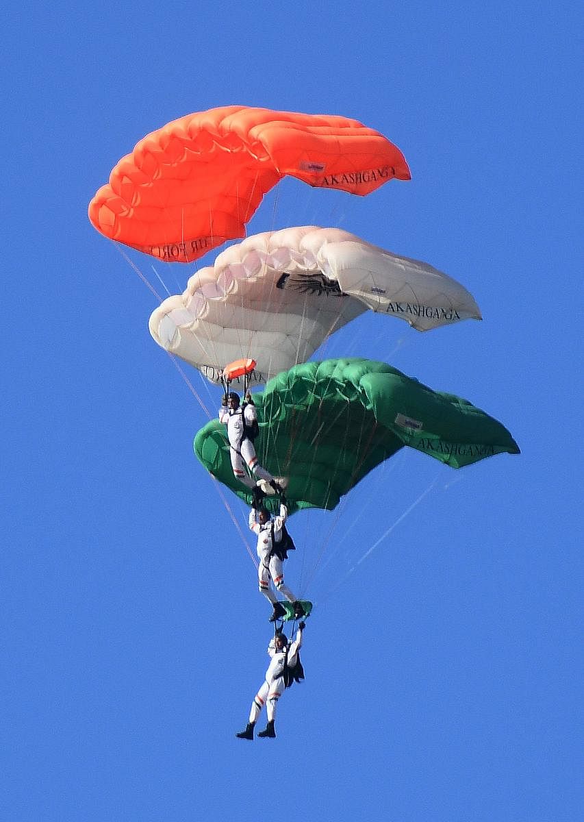 Members of Indian Air Force sky diving team 'Akash Ganga' perform during the combined graduation parade at the Indian Air Force Academy (IAF) in Hyderabad on June 15, 2019. AFP)