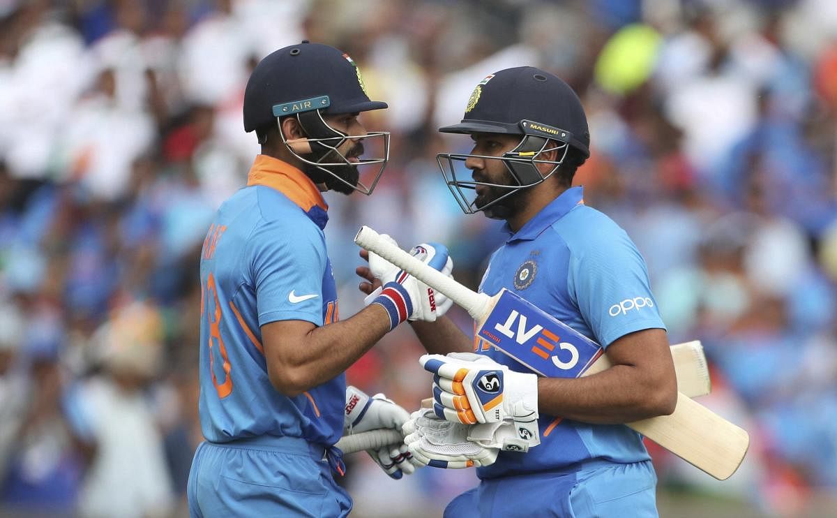 India captain Virat Kohli congratulates Rohit Sharma on scoring a century against Sri Lanka at Headingley (AP/PTI Photo)