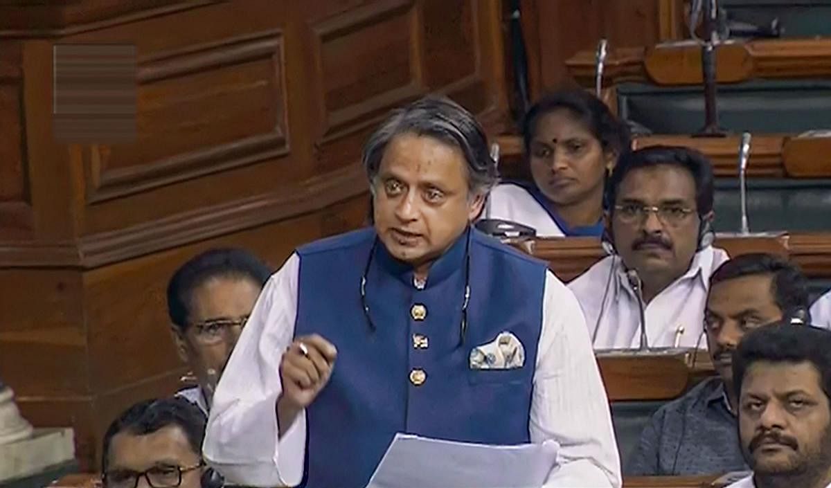 Congress MP Shashi Tharoor speaks in the Lok Sabha during the Budget Session of Parliament, in New Delhi (LSTV/PTI Photo)