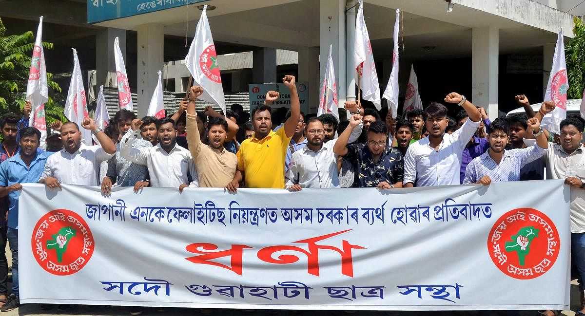 Activists of the All Assam Students’ Union (AASU) stage a protest against the authorities’ over the deaths due to Japanese Encephalitis outbreak, in front of the State Directorate of Health in Guwahati, Tuesday, July 02, 2019. (PTI Photo)