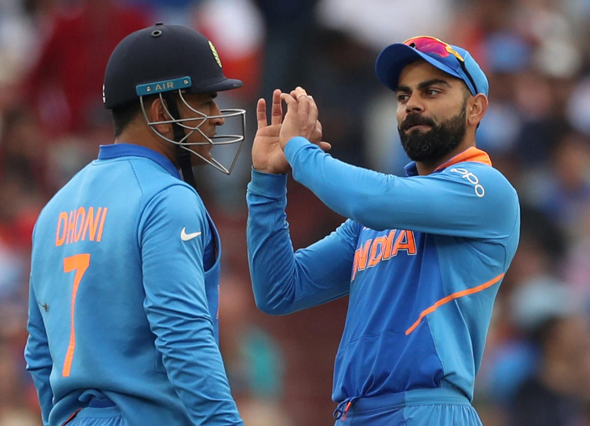 MS Dhoni and Virat Kohli during India's match against New Zealand. Photo credit: Reuters