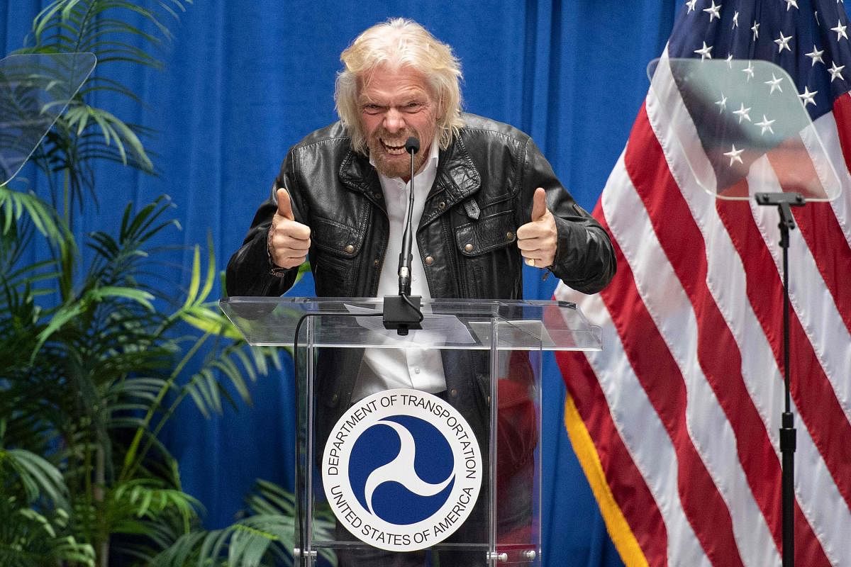 Richard Branson's Virgin Galactic will merge with a New York-listed company to become the world's first publicly-traded space tourism venture, the British billionaire's group announced Tuesday. AFP file photo