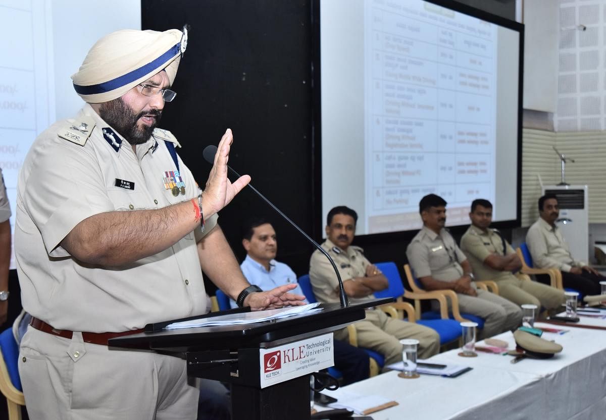 ADGP P S Sandhu speaks at the road safety awareness programme held at the KLETU premises at Vidyanagar in Hubballi on Tuesday.