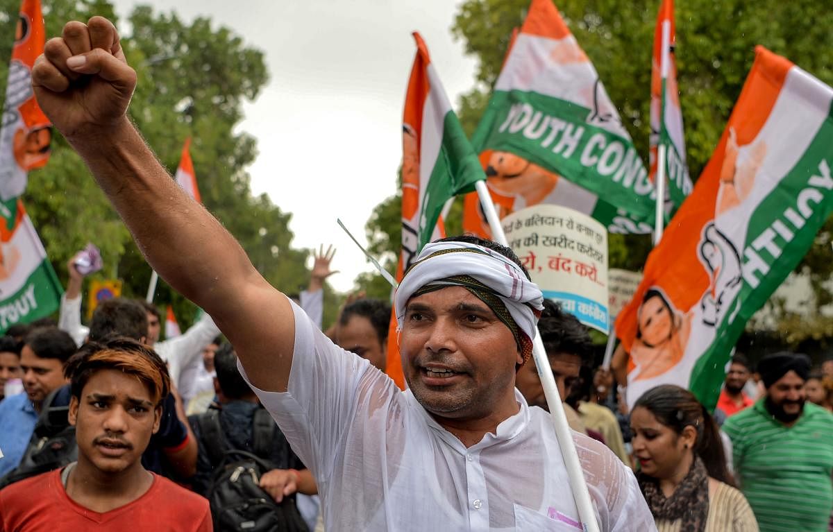 Activists of opposition Congress party's youth wing protest against alleged "horse trading" of lawmakers by Bharatiya Janta Party (BJP) to topple the Congress-JD(S) coalition in Karnataka in New Delhi on July 9, 2019. (AFP)