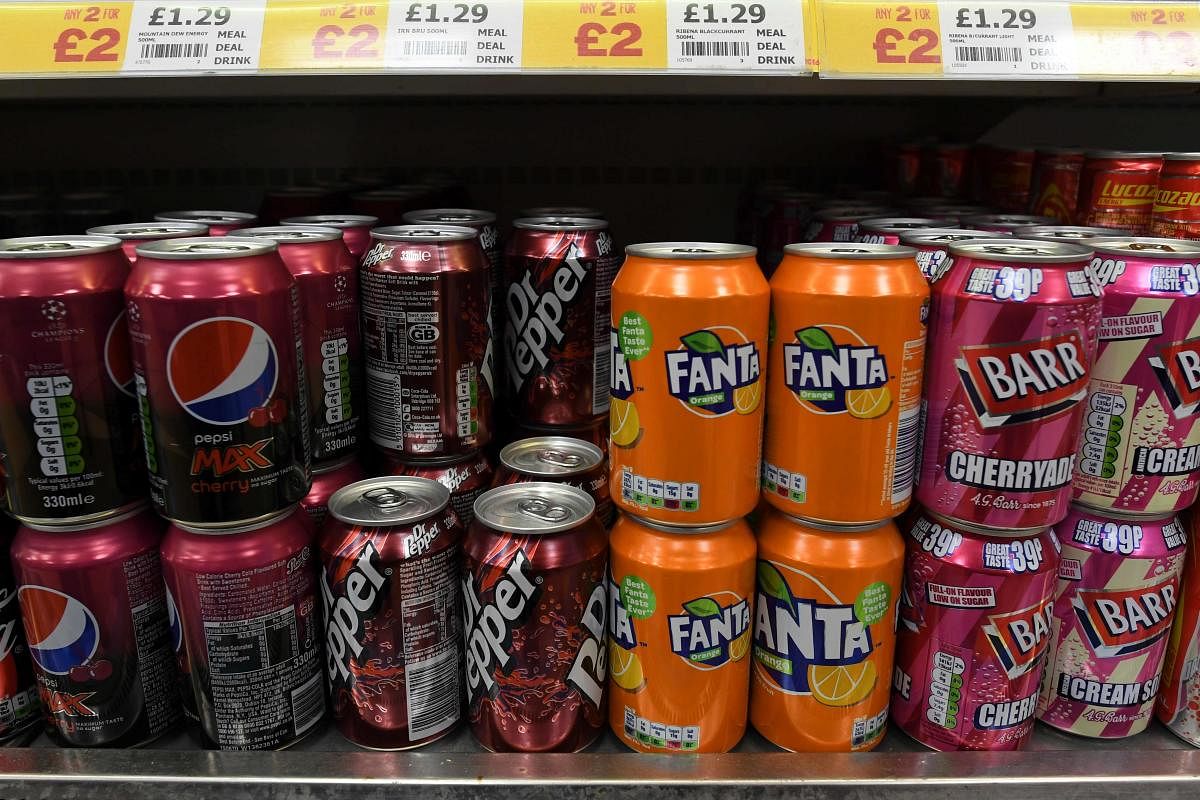 Consumption of sugary drinks has risen worldwide in the last few decades and is linked to obesity, which itself increases cancer risk. (AFP File Photo)