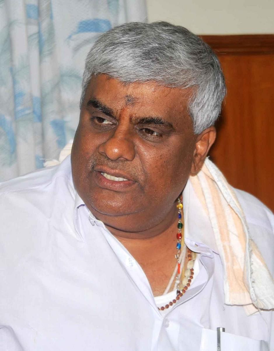 Revanna offered prayers in the name of his brother Kumaraswamy for 20 minutes at the hilltop shrine. (DH File Photo)