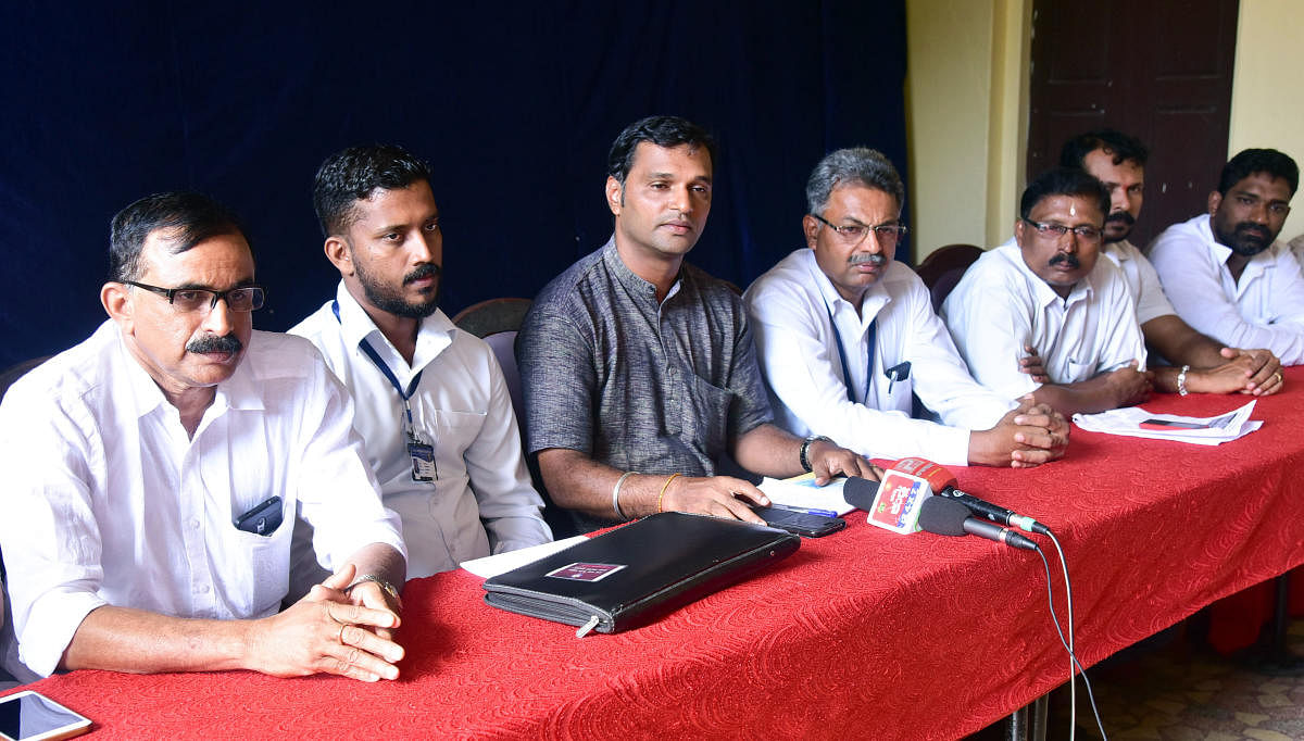Sunil Kumar Bajal, Dakshina Kannada District Schoolchildren Vehicle Drivers’ Association honorary president, speaks to reporters in Mangaluru on Friday.