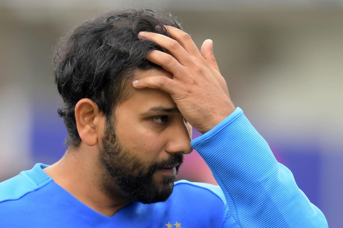 India's Rohit Sharma reacts at the end of play during the 2019 Cricket World Cup first semi-final between New Zealand and India (AFP File Photo)