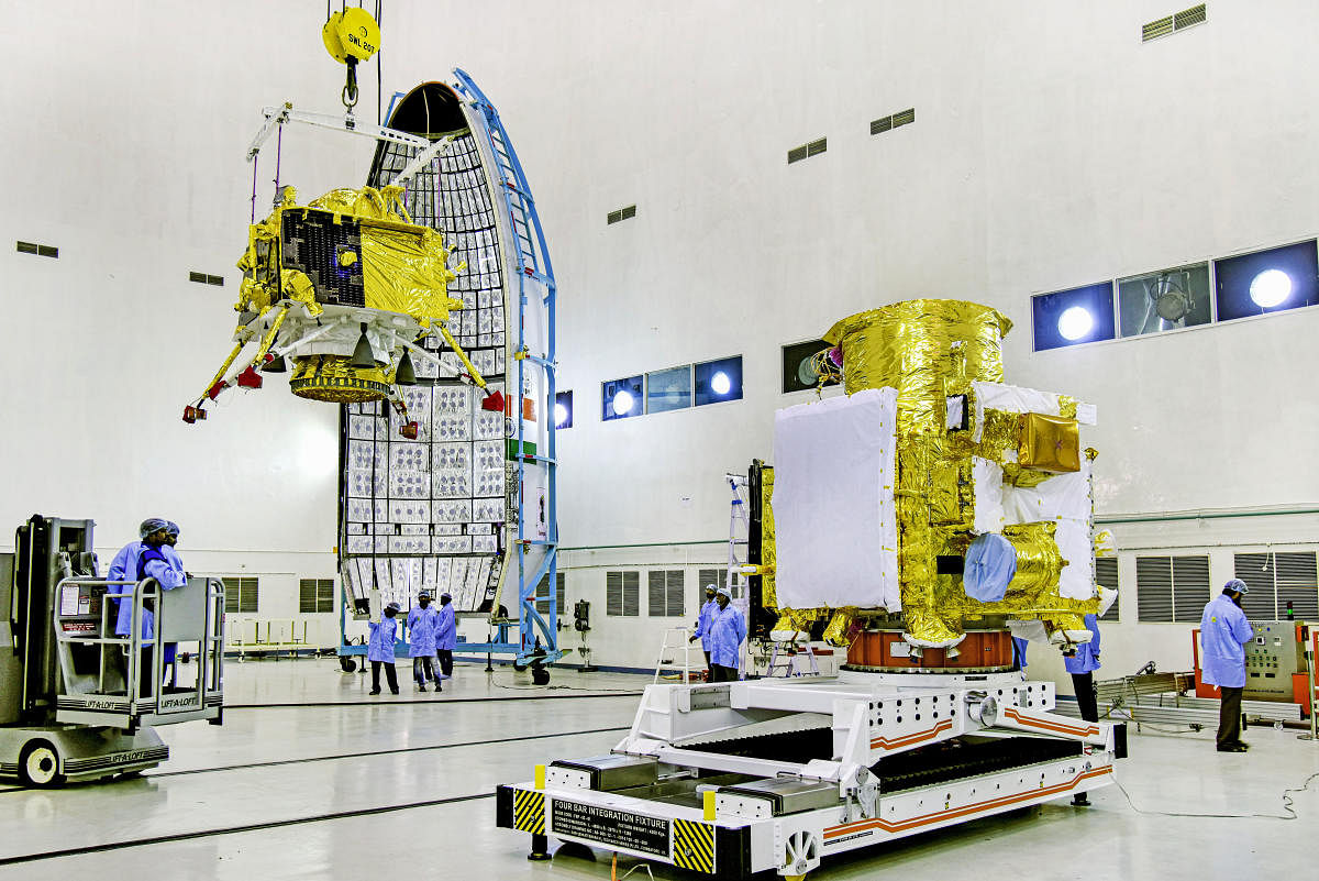 Sriharikota: In this picture released by ISRO Thursday, July 11, 2019, officials carry out the hoisting of the Vikram Lander during the integration of Chandrayaan-2, at the launch center in Sriharikota. The space mission, which aims to place a robotic rov