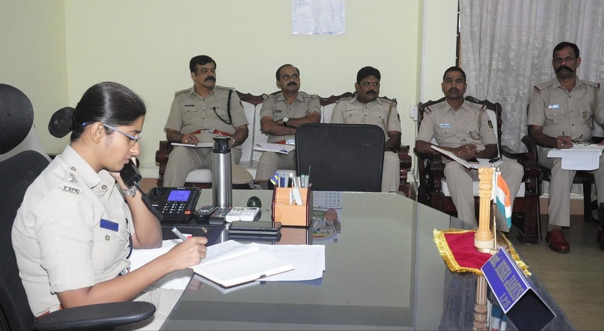 Udupi Superintendent of police Nisha James replies to a caller during the phone-in programme on Friday.