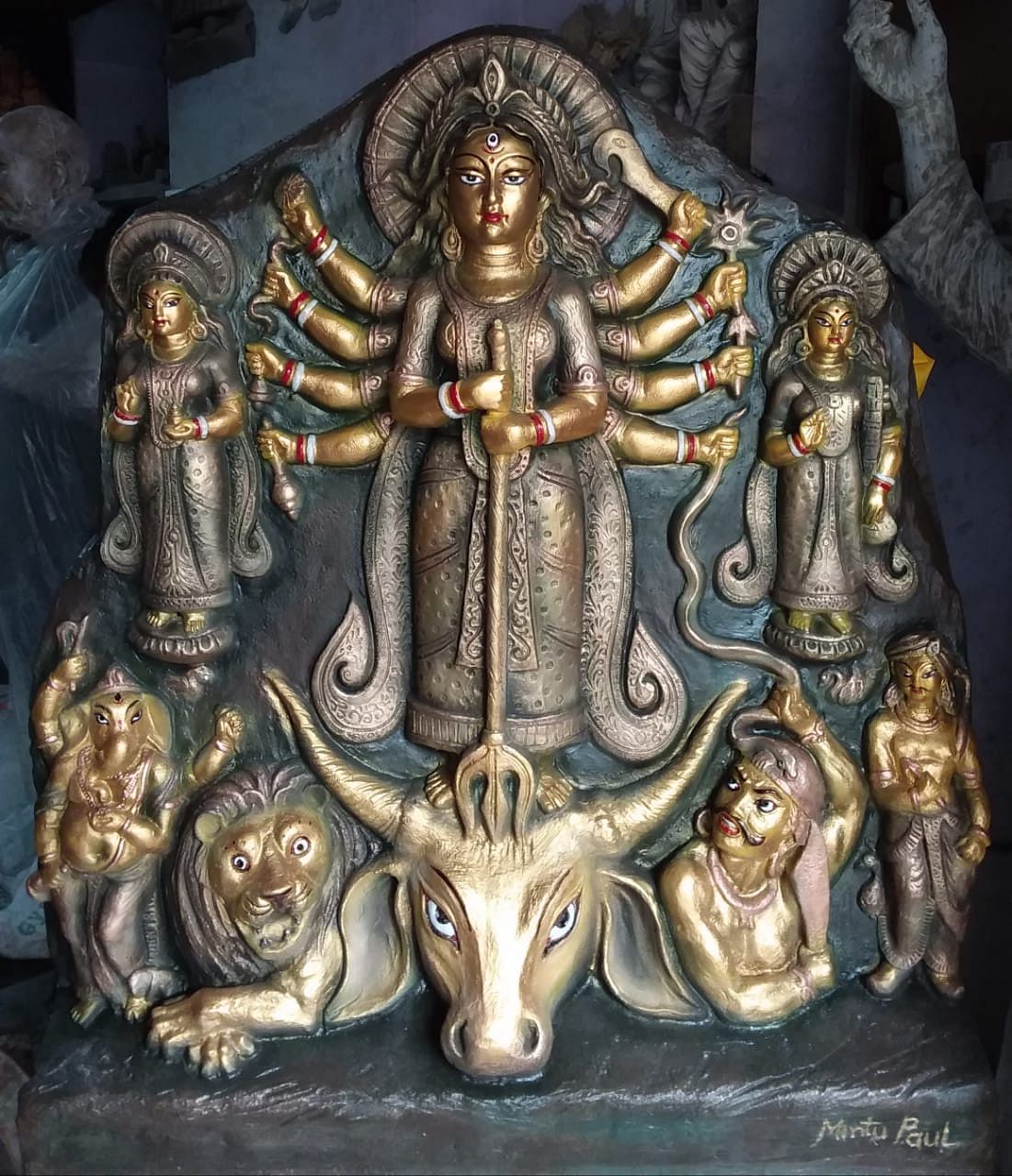 A miniature model of the proposed gold plated Durga idol.